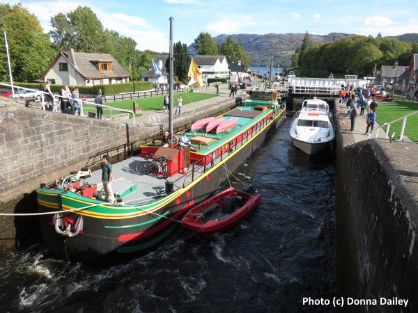 Fingal the barge in the lock at Fort Augustus while cruising the Caledonian Canal on an activity and walking holiday in the highlands of Scotland