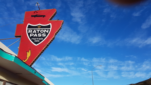 Raton Pass Motor Inn sign