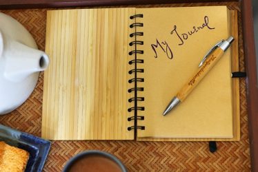 writing in a travel journal