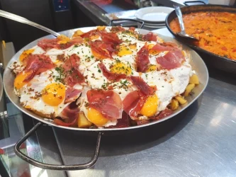Broken Eggs dish at the Atarazanas Market in Malaga